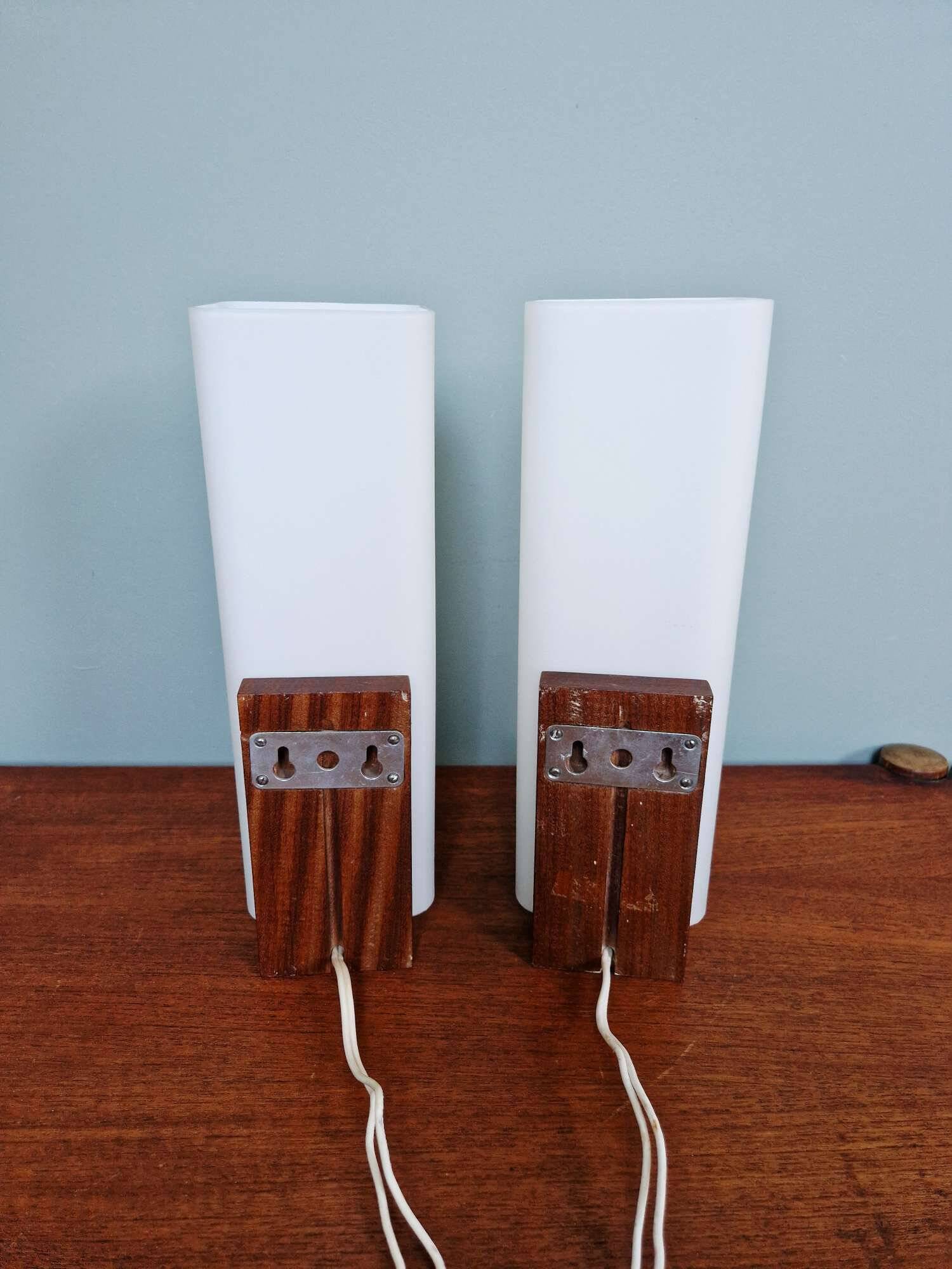 Pair of teak and white opaline wall lights, designed by Louis Kalff, 1960