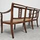 Directoire canapé in walnut with brass inlays, late 18th century.