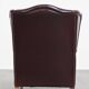 Fauteuil à oreilles en cuir de vachette rouge bordeaux de style anglais