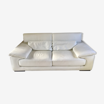 Three-seater white leather sofa