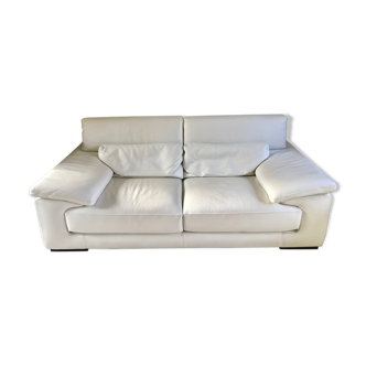 Three-seater white leather sofa