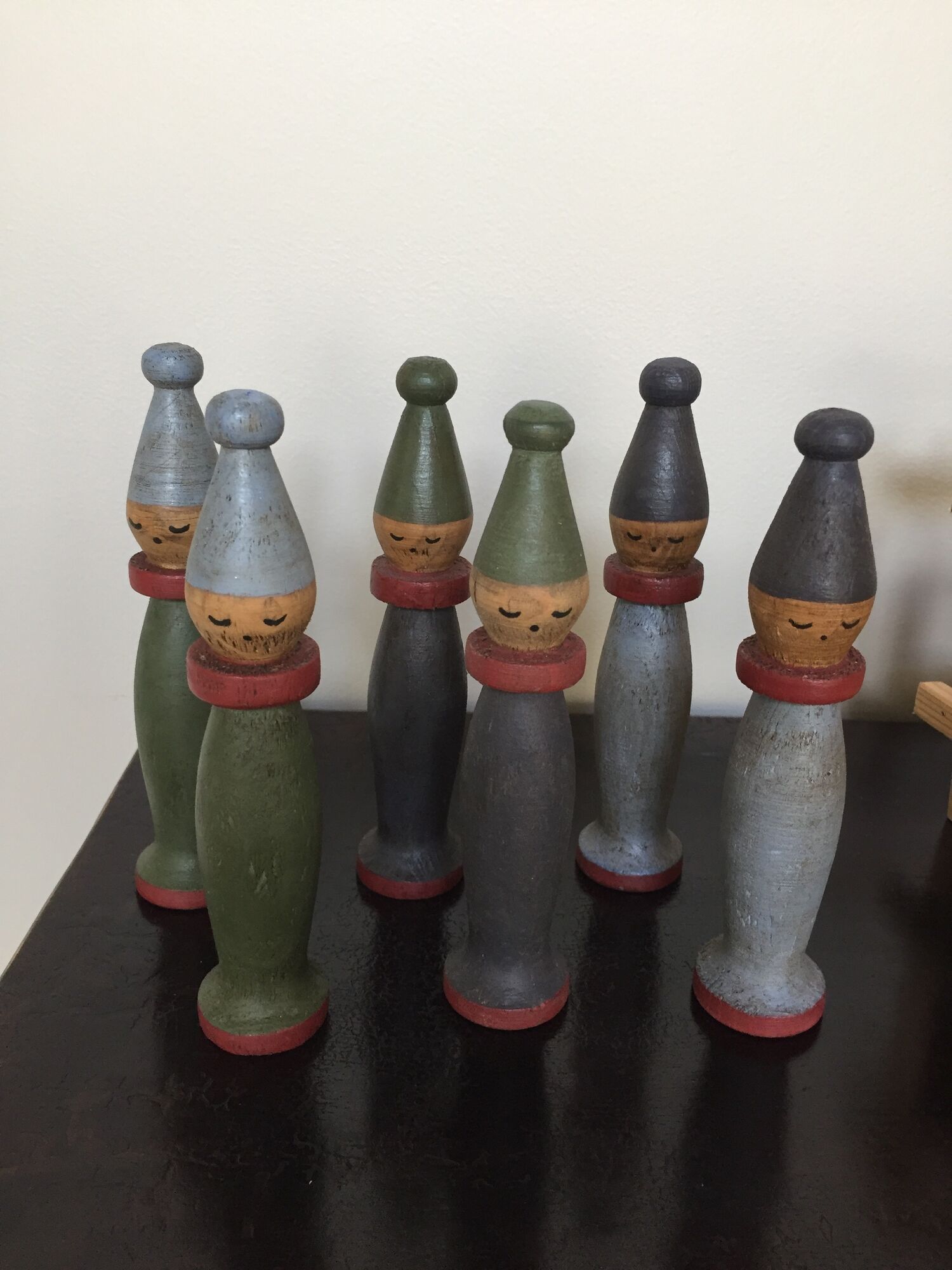 Set of Moulin Roty brand wooden bowling on roller cart, limited series.