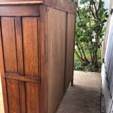 Spanish furniture with carved wood profiles and coats of arms from the 1950s.