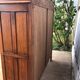 Spanish furniture with carved wood profiles and coats of arms from the 1950s.