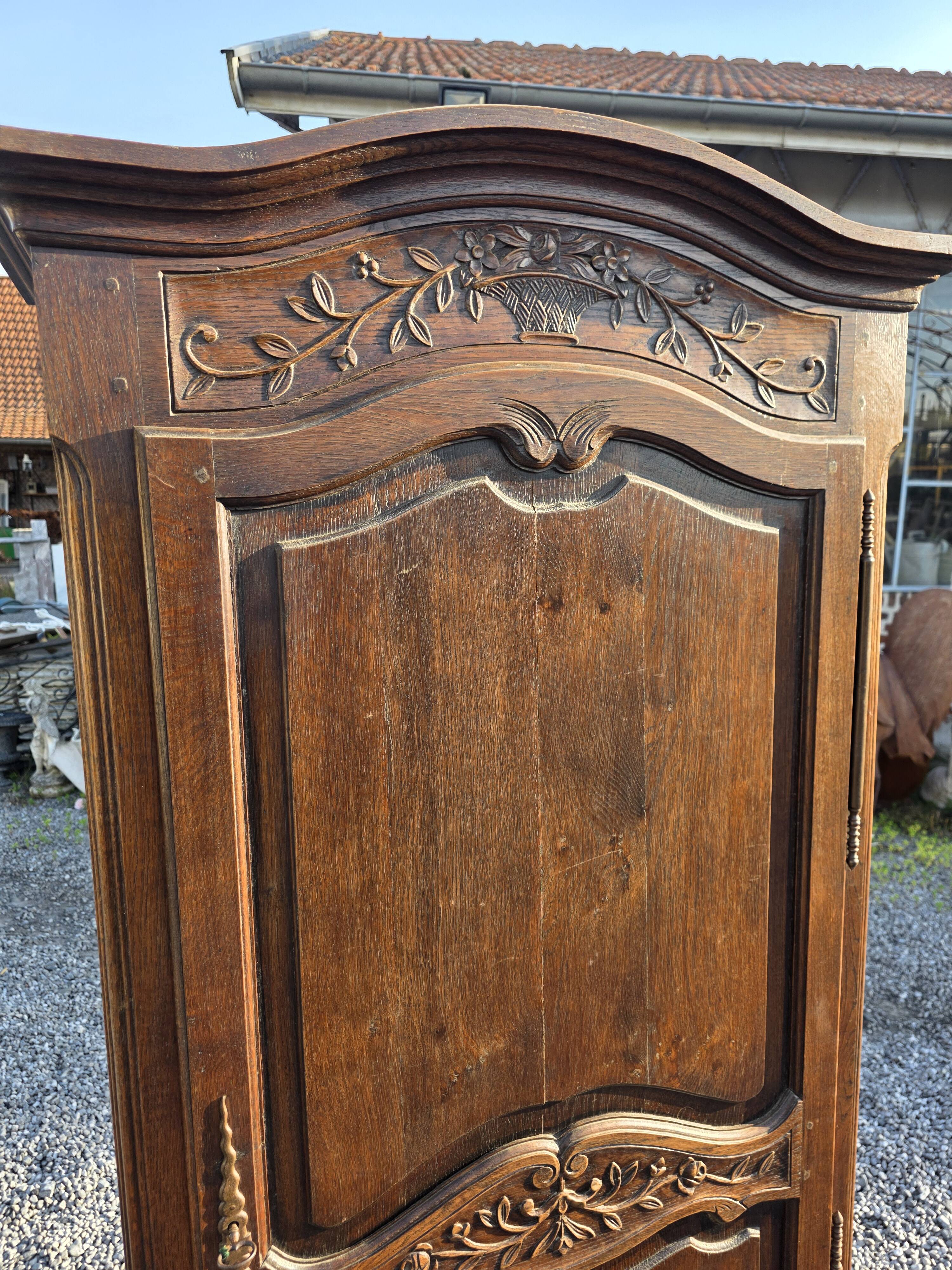 Louis XV style bonnetière in solid oak
