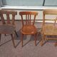 Set of 12 mismatched wooden bistro chairs