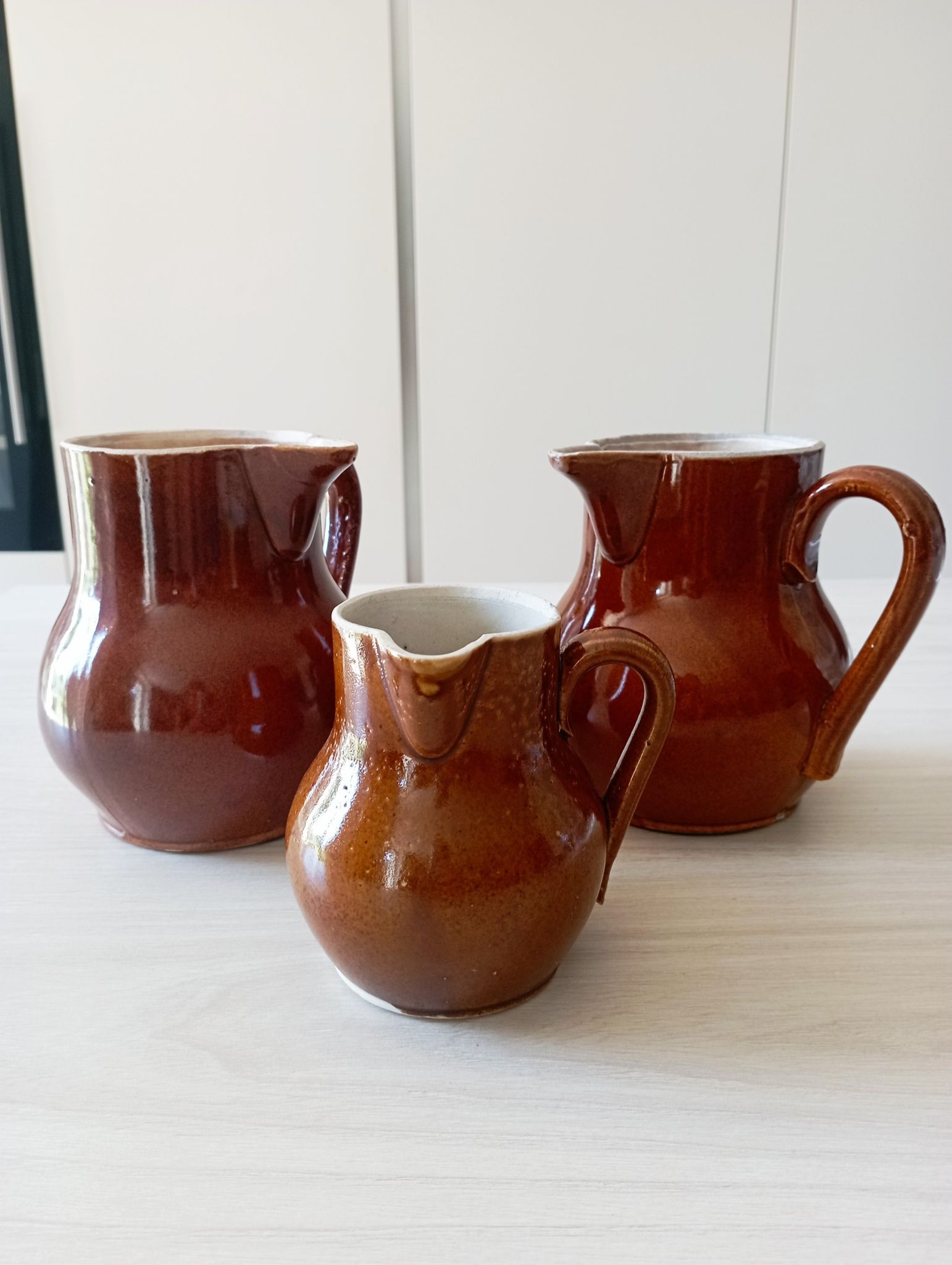 Set of 3 antique pitchers