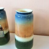 Pair of enamelled sandstone vases