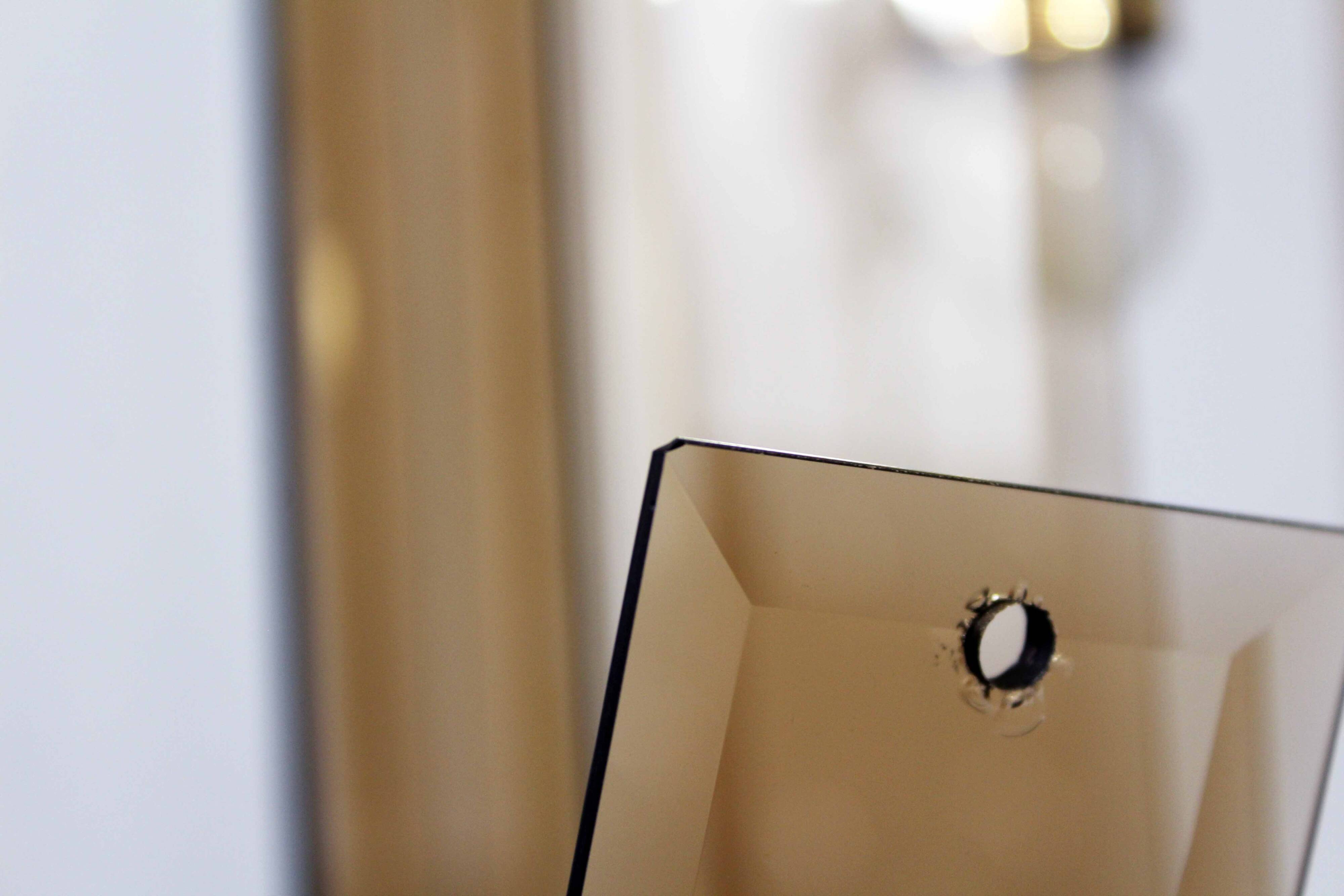 Italian chandelier in brass and beveled glass