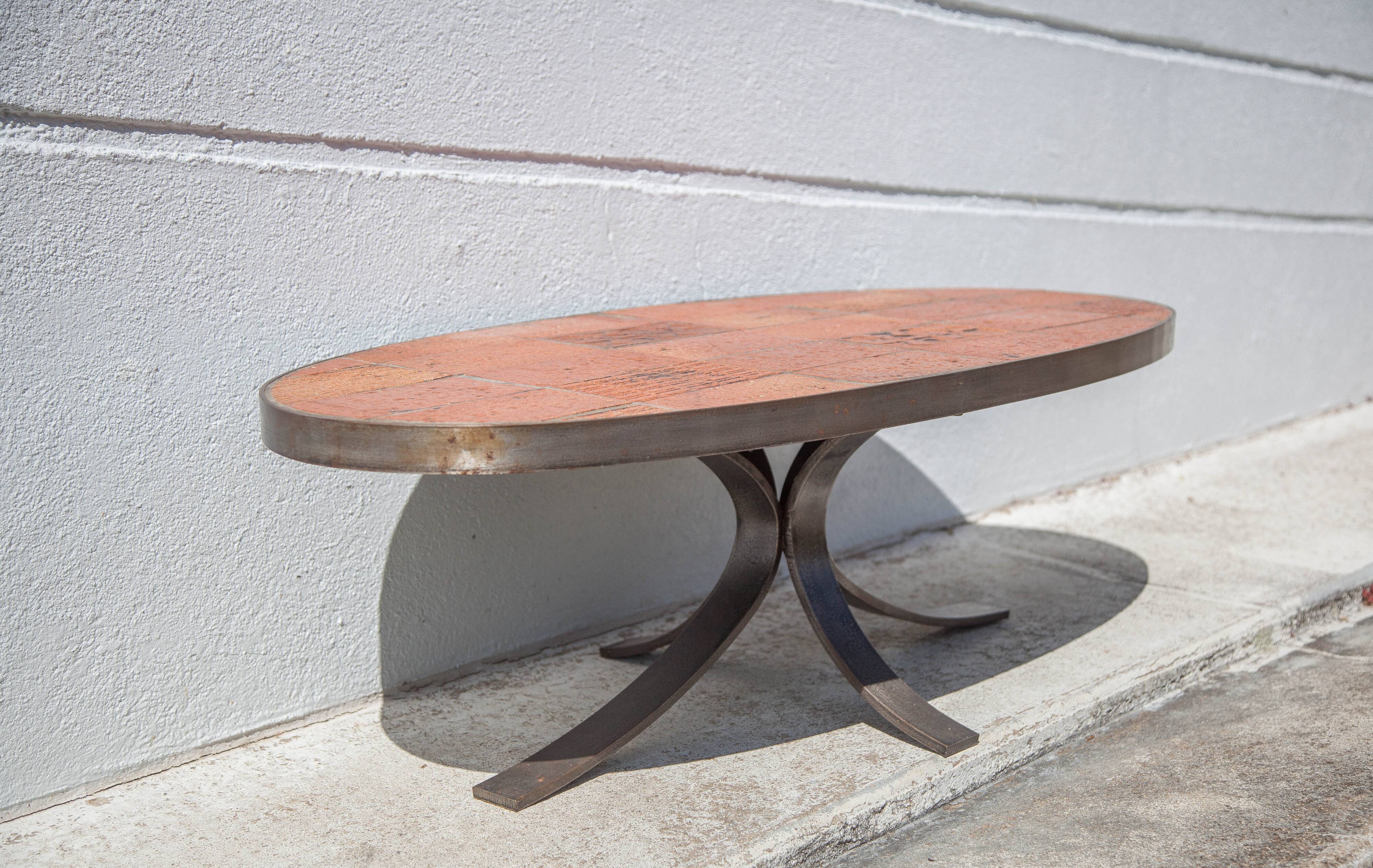Jean Jaffeux coffee table, glazed lava stone table with wrought iron structure, 60's