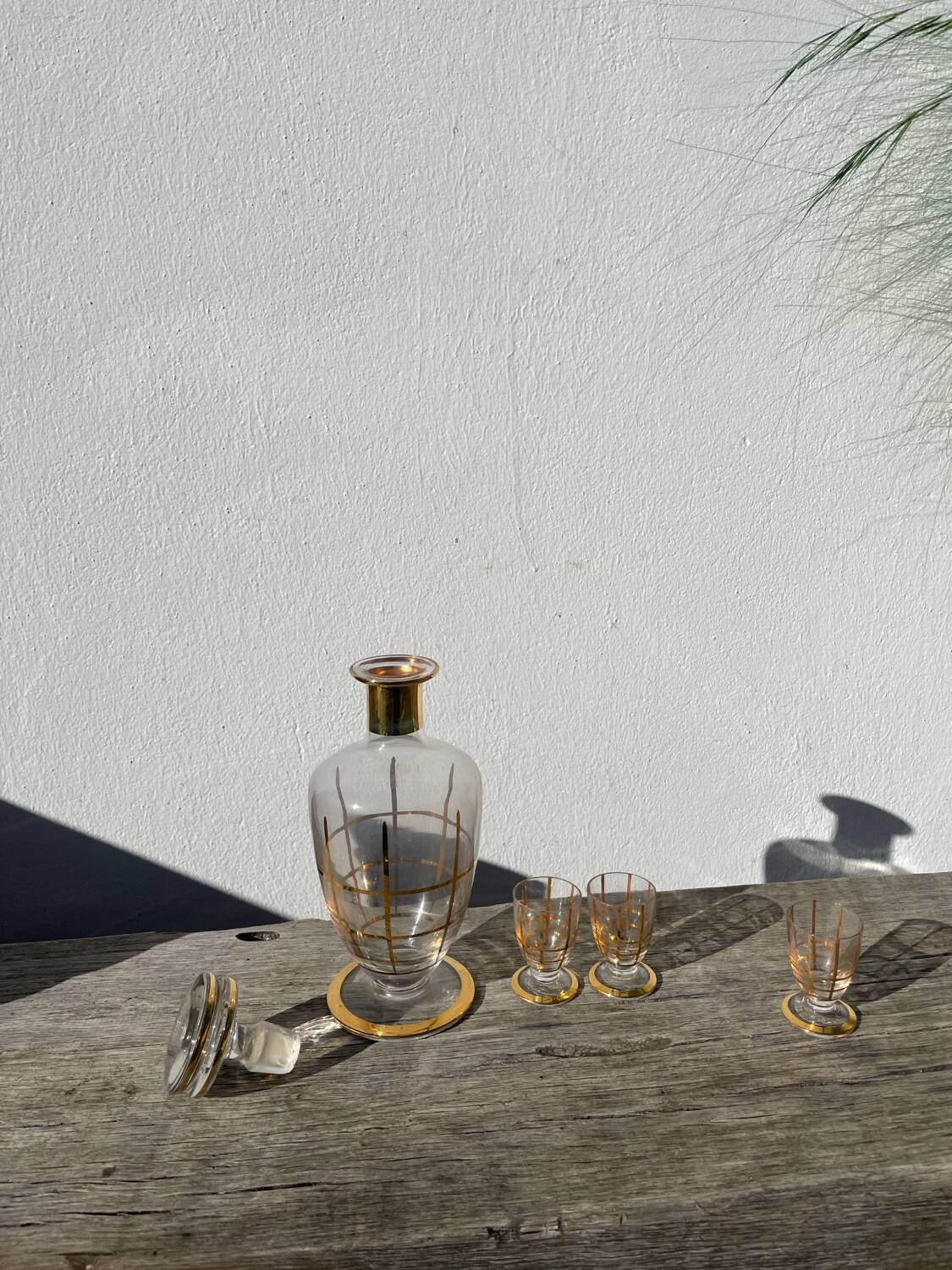 Art Deco glass and gold carafe or vase from the 1950s.