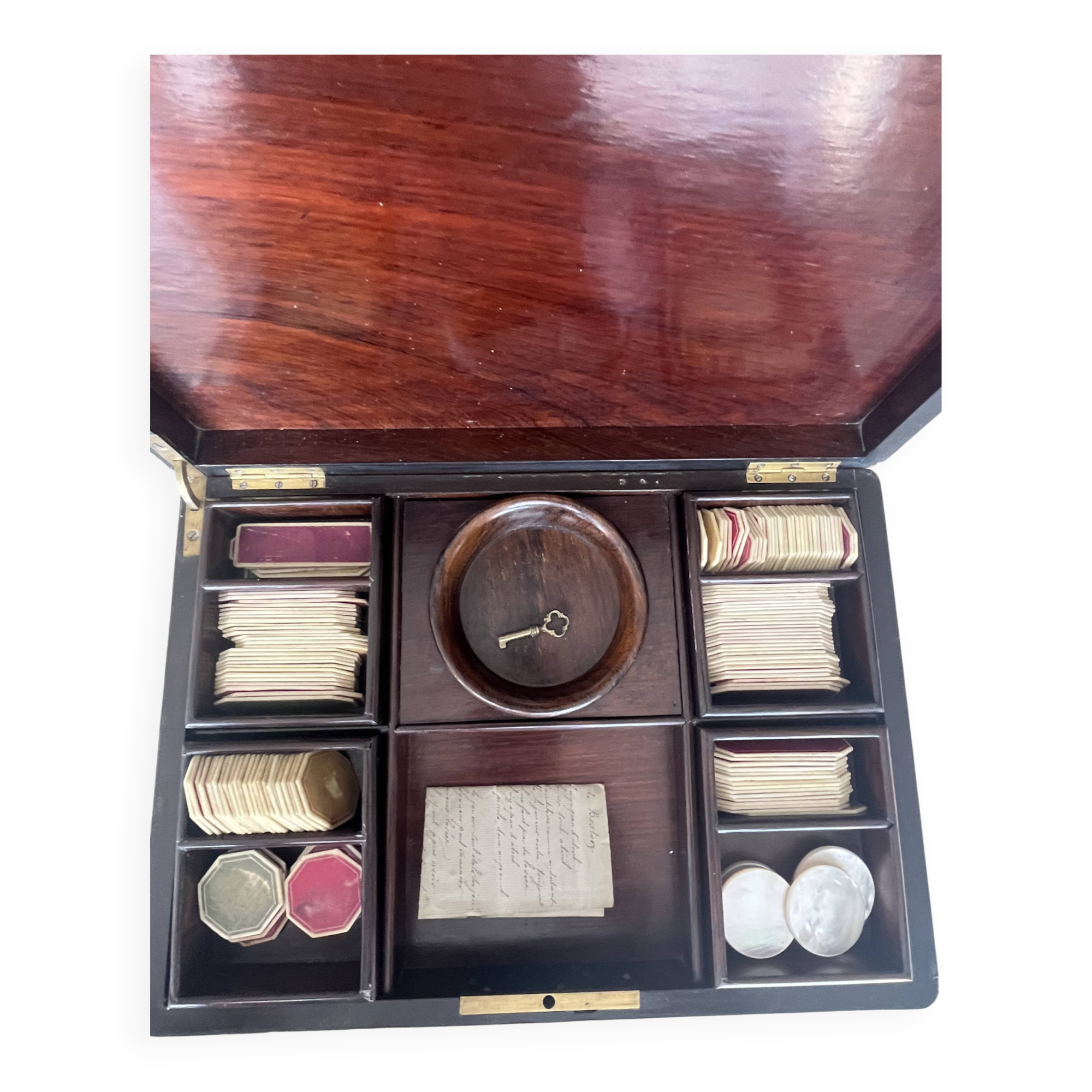 Antique Boston game box from the 19th century - marquetry, tokens, and handwritten rules.