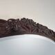 Large mirror (2 metres) Art Nouveau in carved mahogany with high-relief decoration.