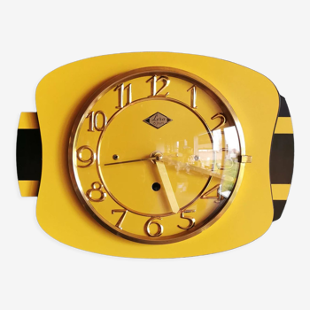 Horloge formica vintage pendule murale silencieuse rectangulaire "Lora jaune noir"