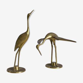 Couple of brass herons