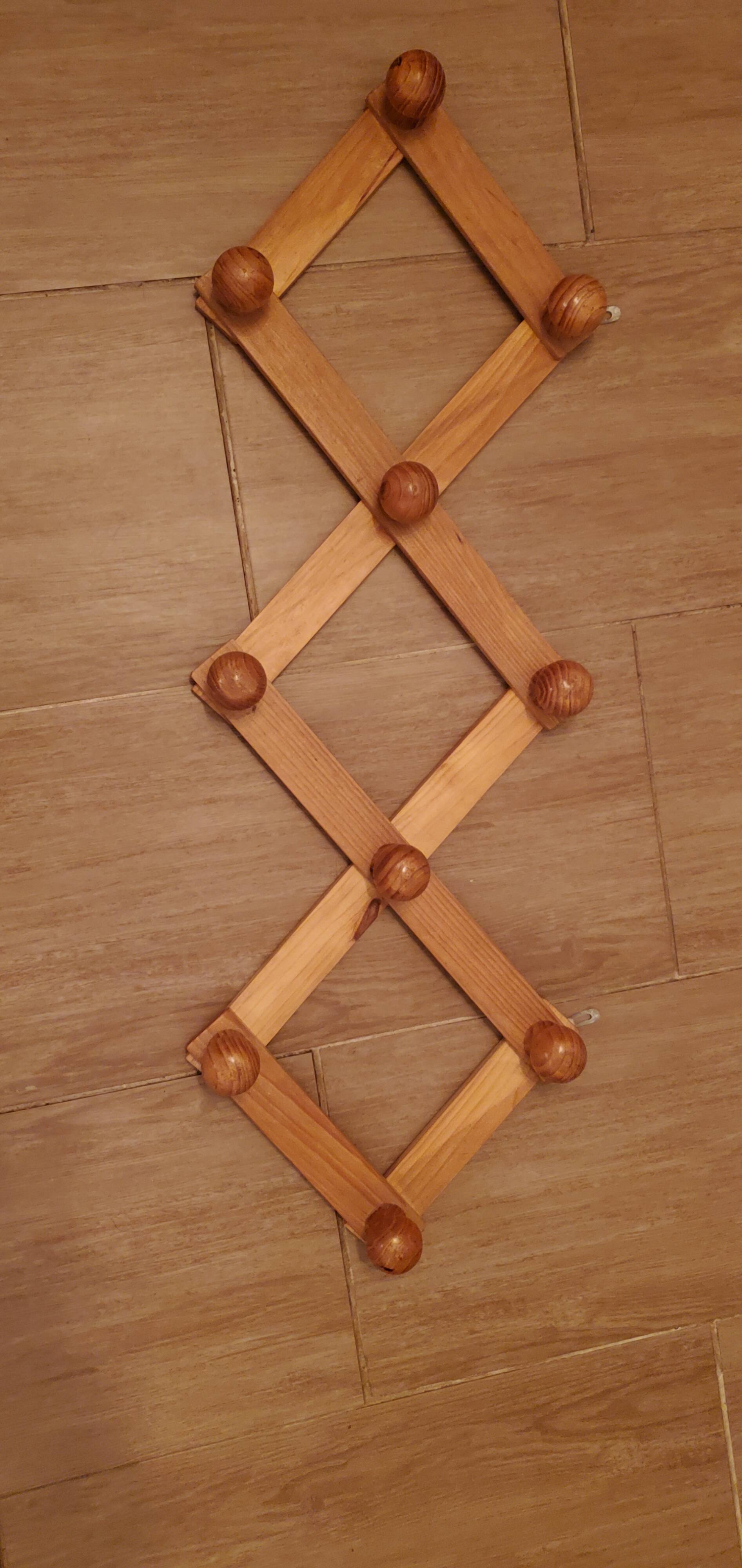 Accordion wall coat rack