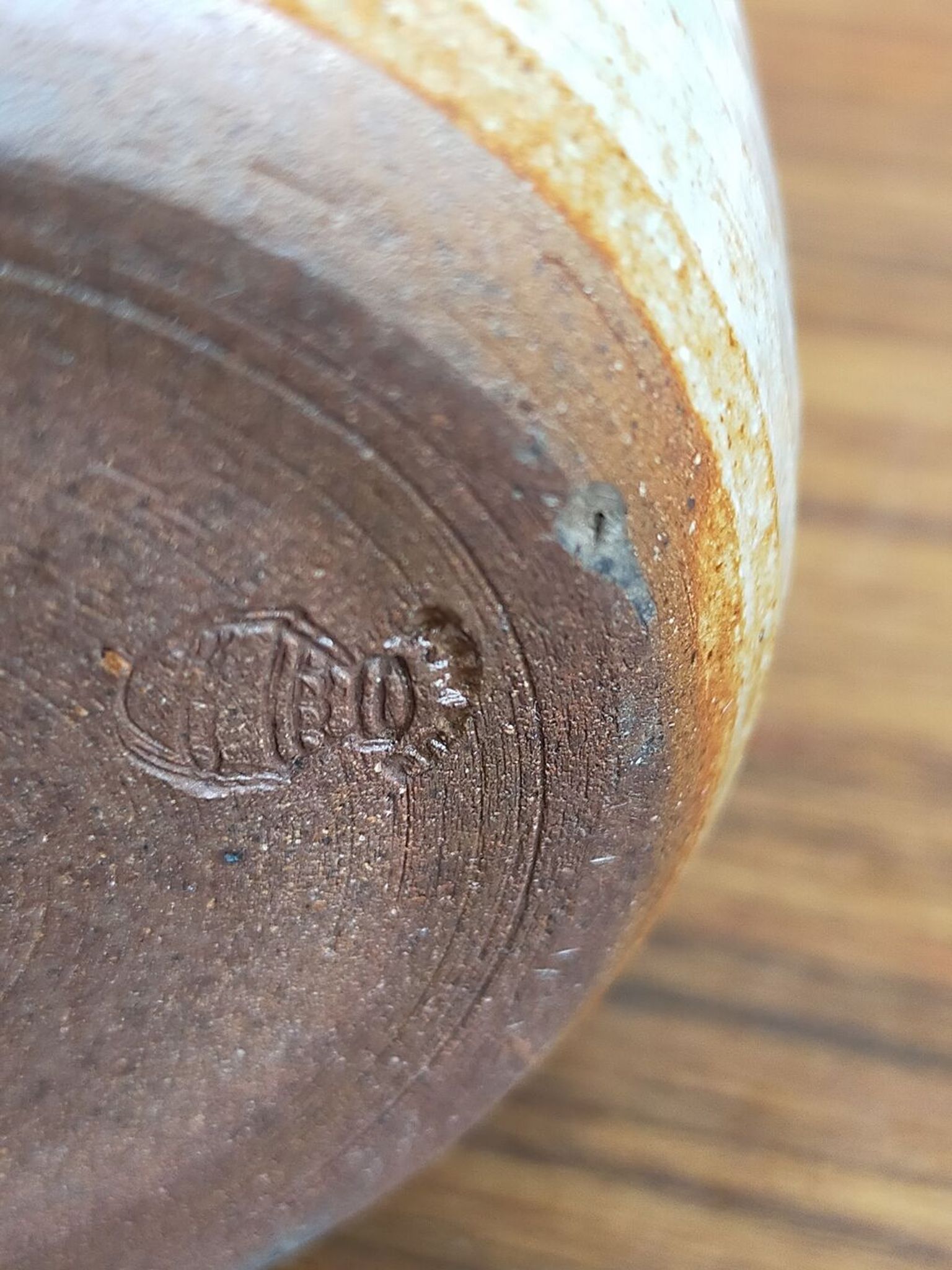 Light stoneware potter's bottle with vintage spout