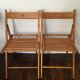 2 folding wooden chairs