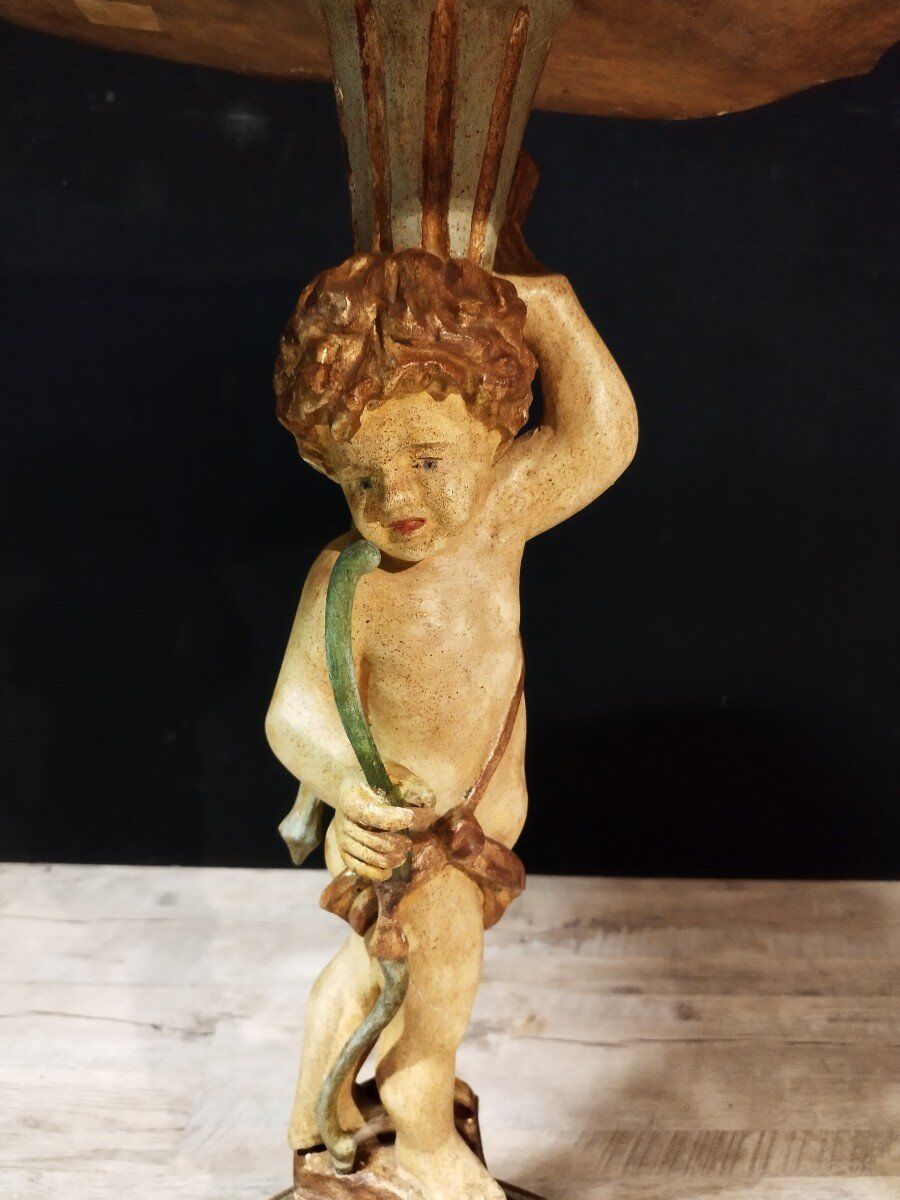 Pedestal table harness with angelot decoration in painted wood