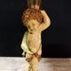 Pedestal table harness with angelot decoration in painted wood