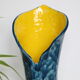 Handmade ceramic vase, glazed blue and yellow, vintage