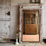 The large patinated trumeau mirror