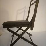 Ancienne chaise d'enfant pliante en fer forgé. Début XXème.