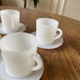 Espresso coffee cup service, Nestlé promotional items, in white glass.