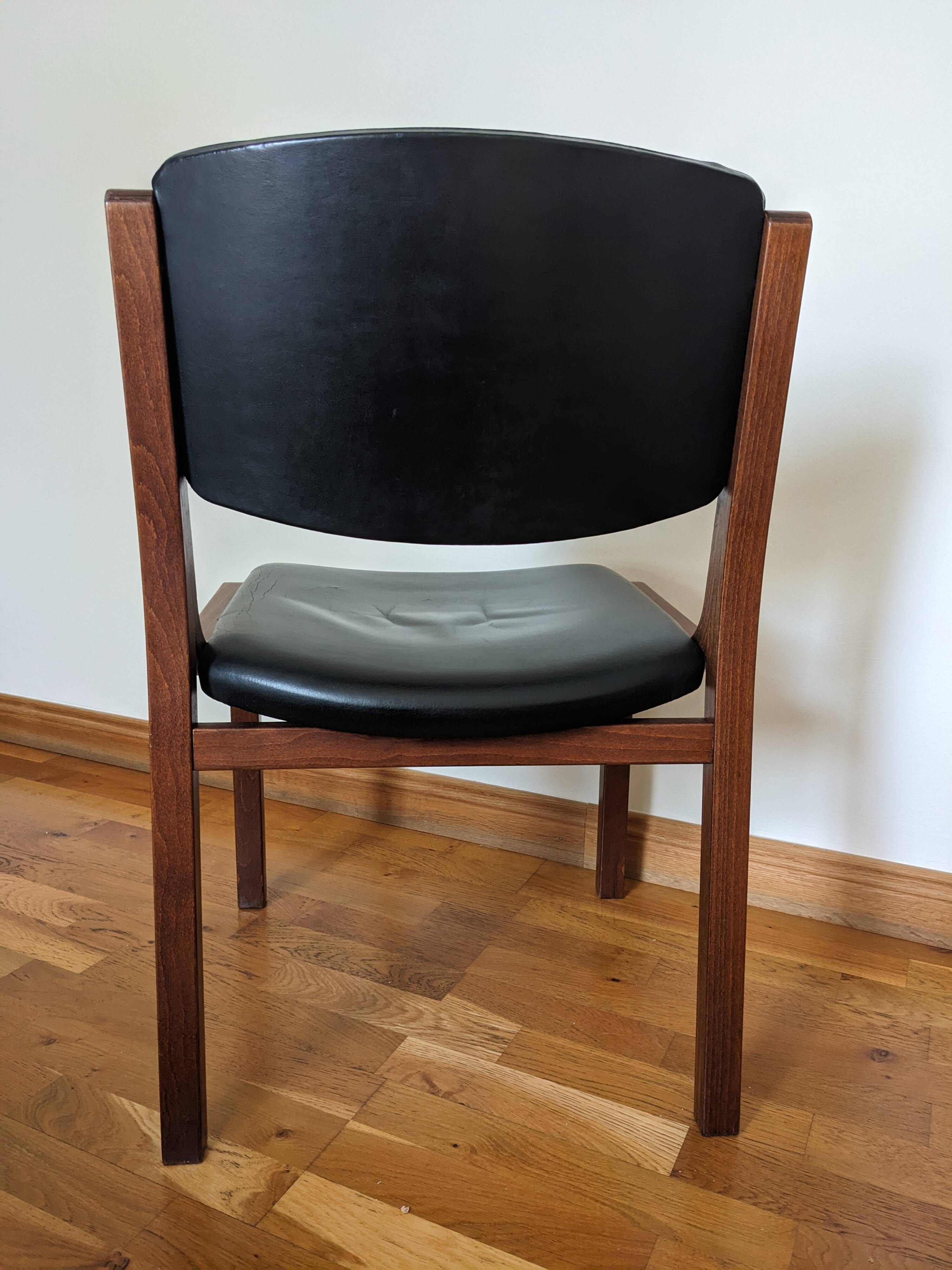 Vintage leather and wood chair pair