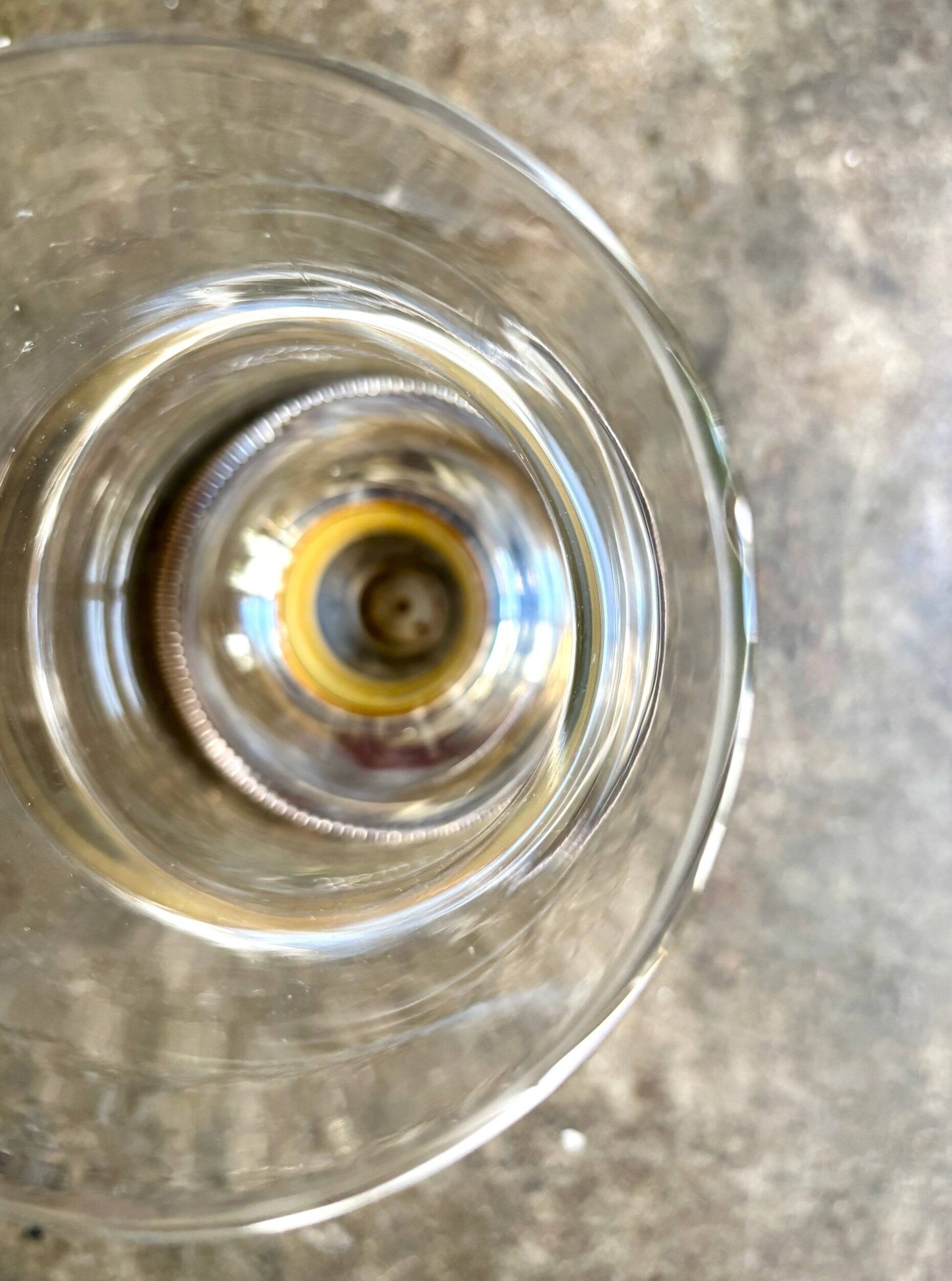 Glass and silver-plated metal tealight holder