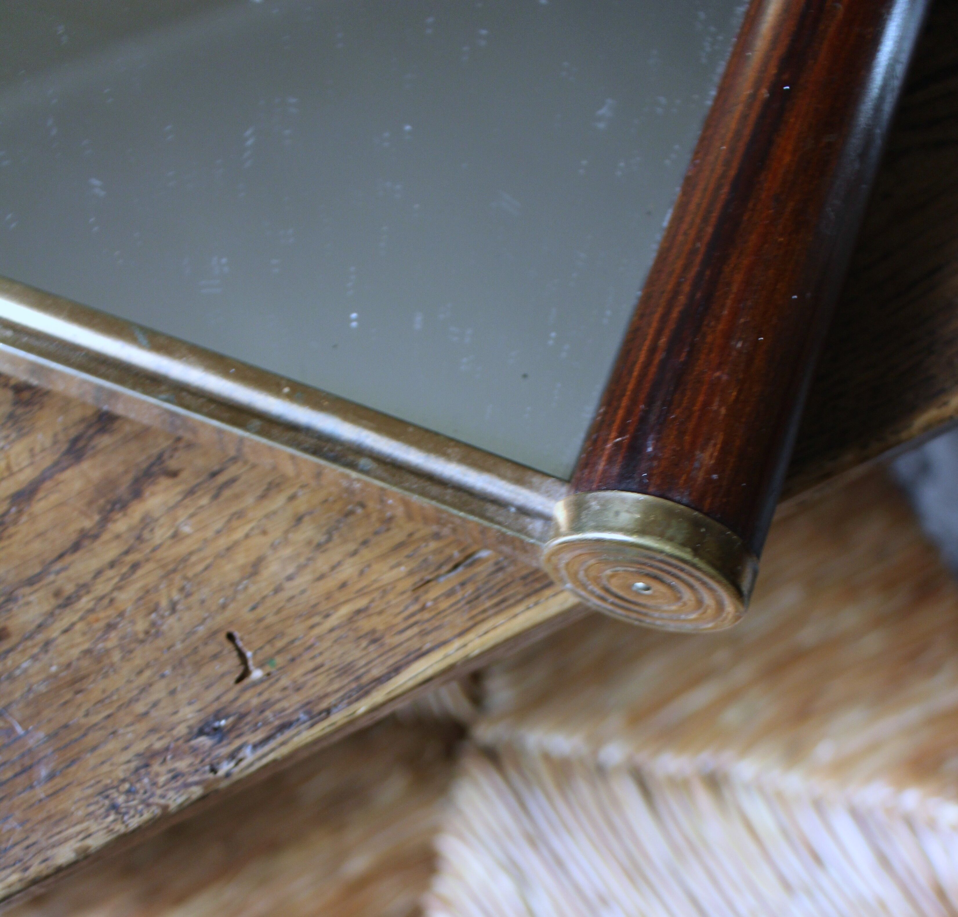 Rectangular mirror tray with wooden handles and gilding.