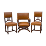 Fauteuil et deux chaises