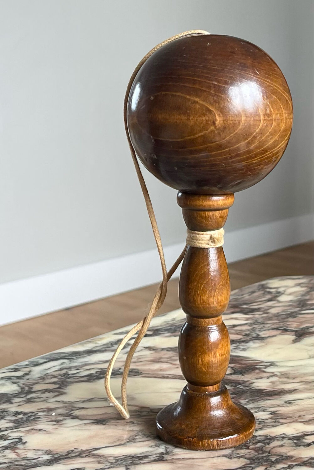 Old bilboquet in turned wood