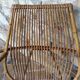 Rattan armchair and his feet rest