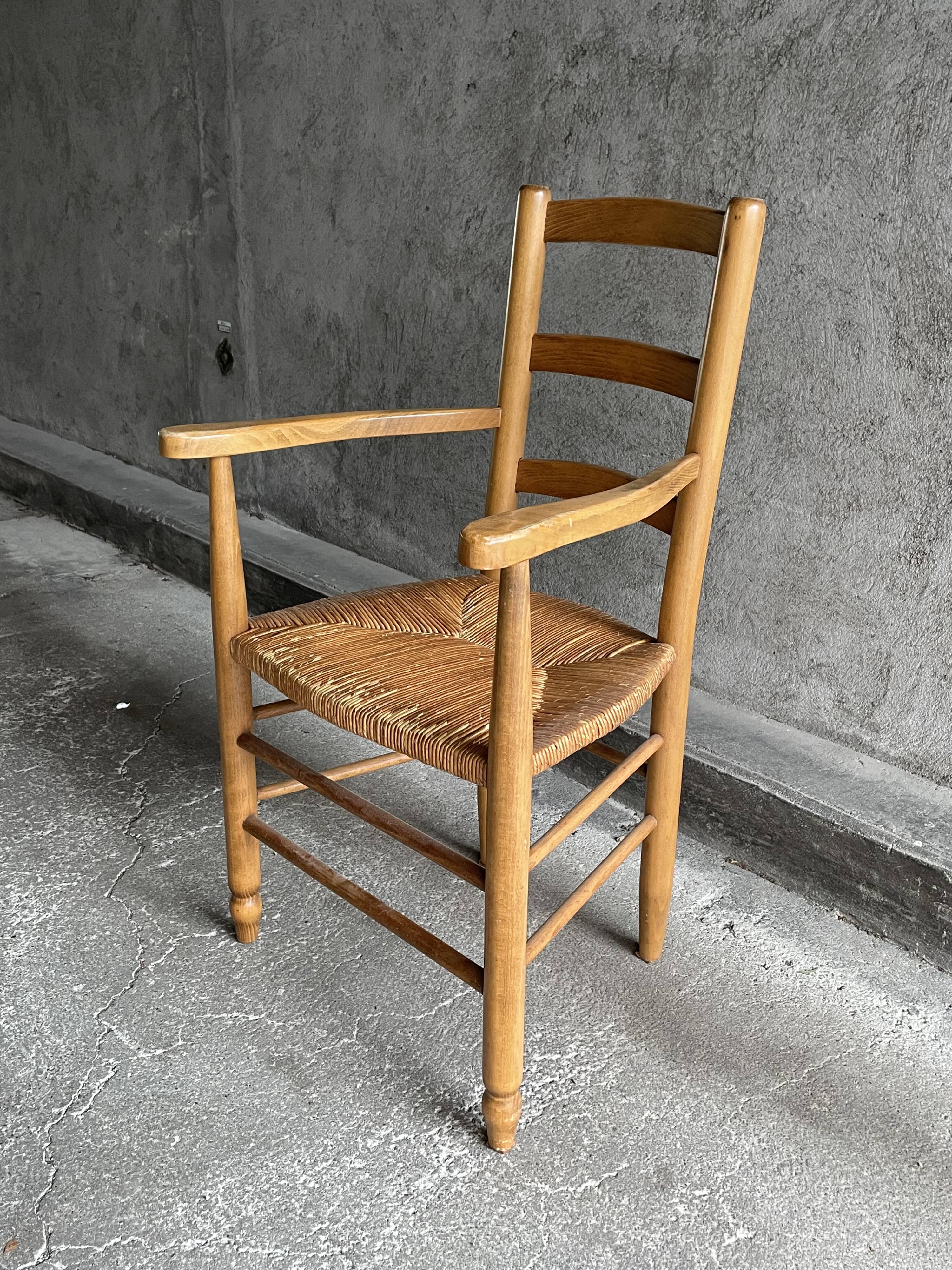 Straw chair with armrests, France