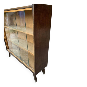 Mid-century brown wooden library (beech & pine) with glass doors from the 1960s.