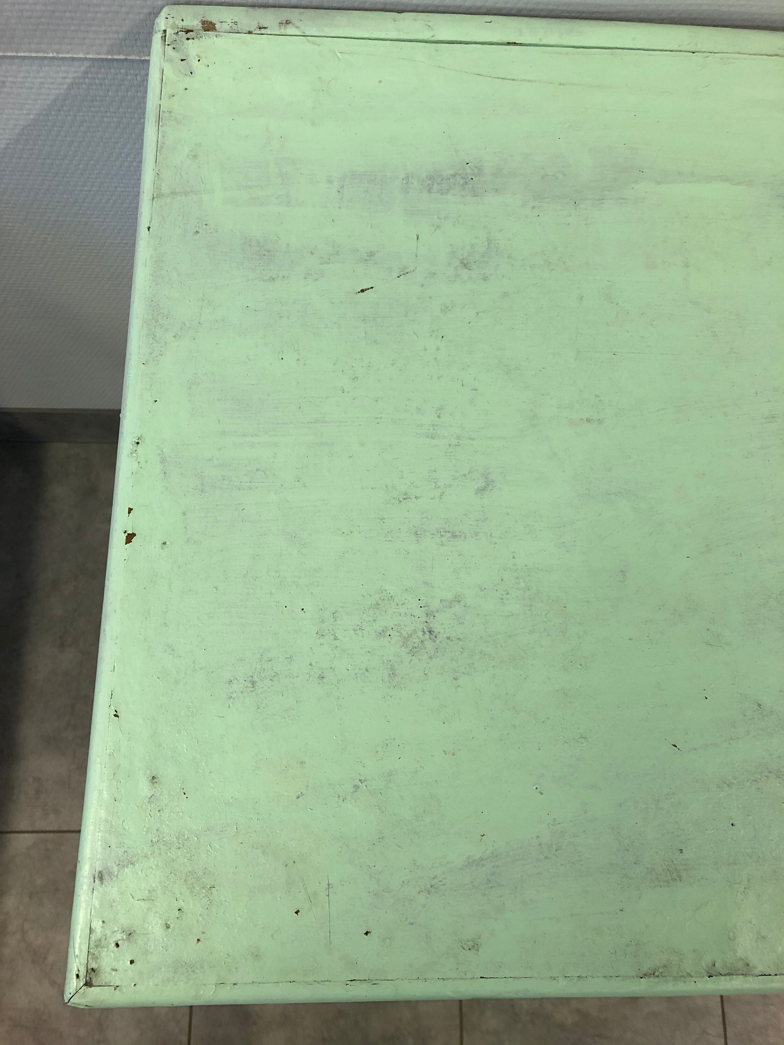 Low green patinated furniture