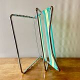 Vintage folding beach chair in chrome metal and woven plastic