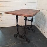 Bistro table with cast iron legs and oak top