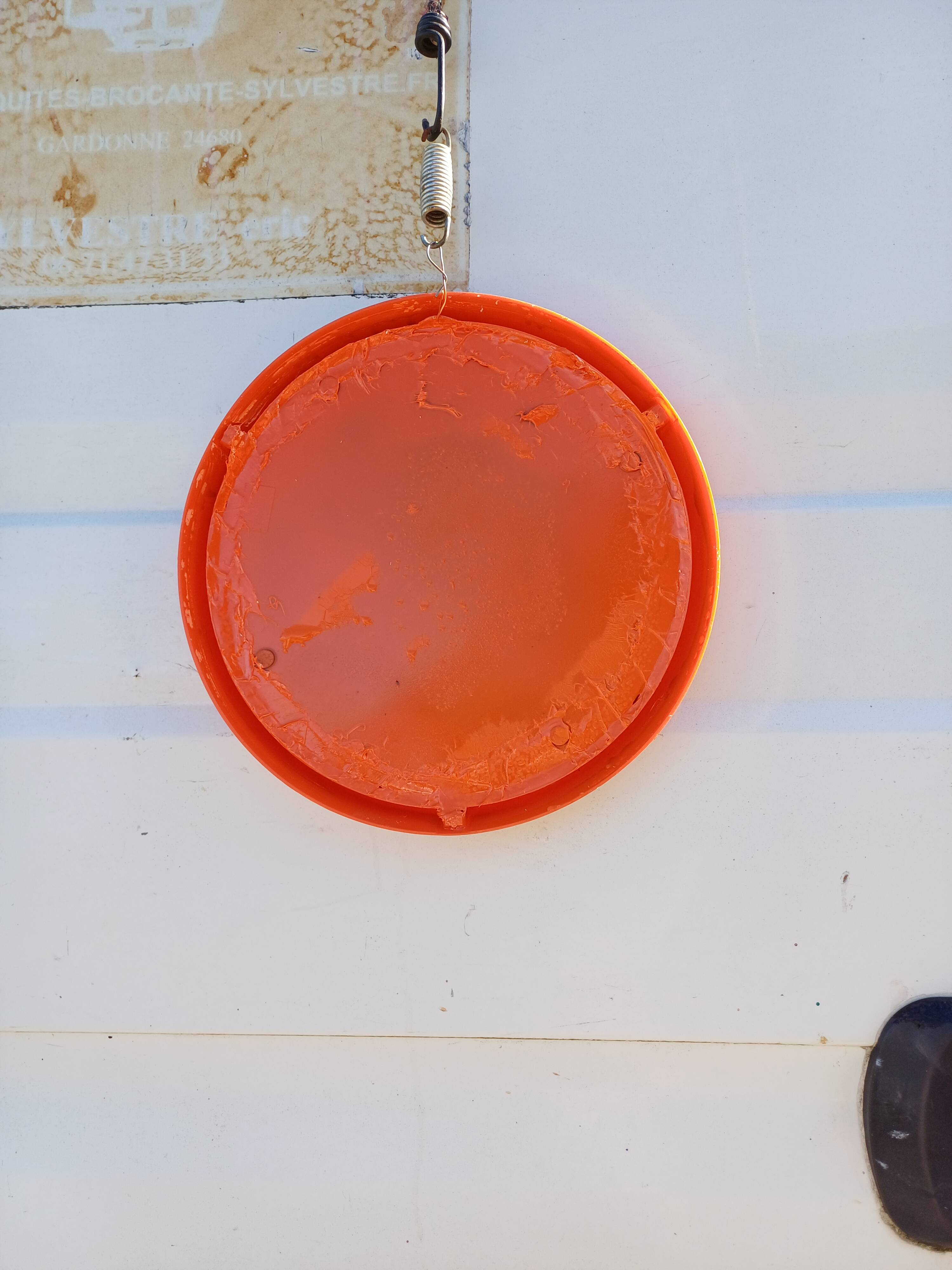 Vintage round plastic orange mirror