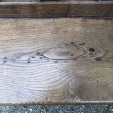 Duo of old solid oak benches with backs and armrests.