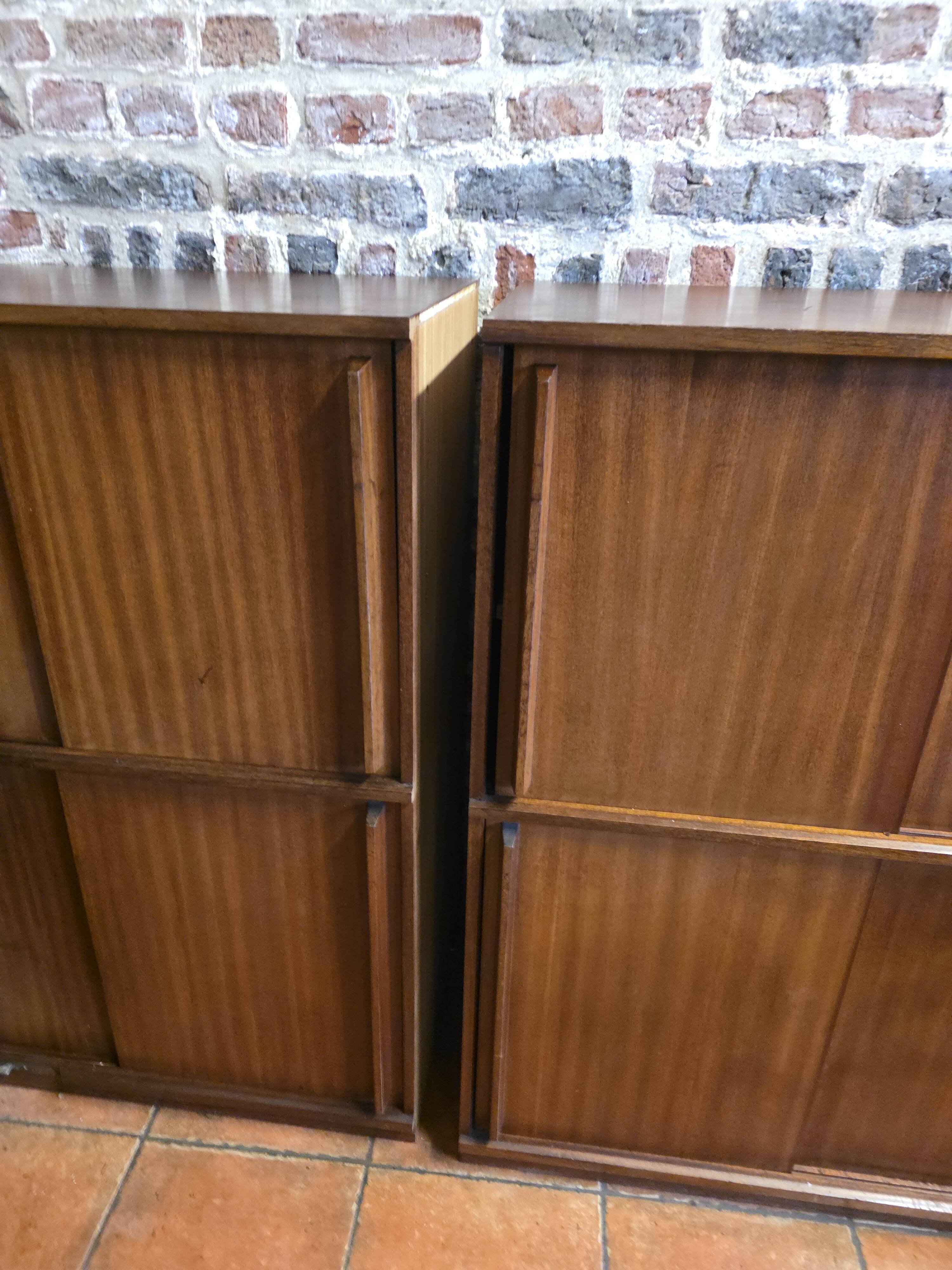 Modular corner library Oscar from the 1960s with sliding doors.