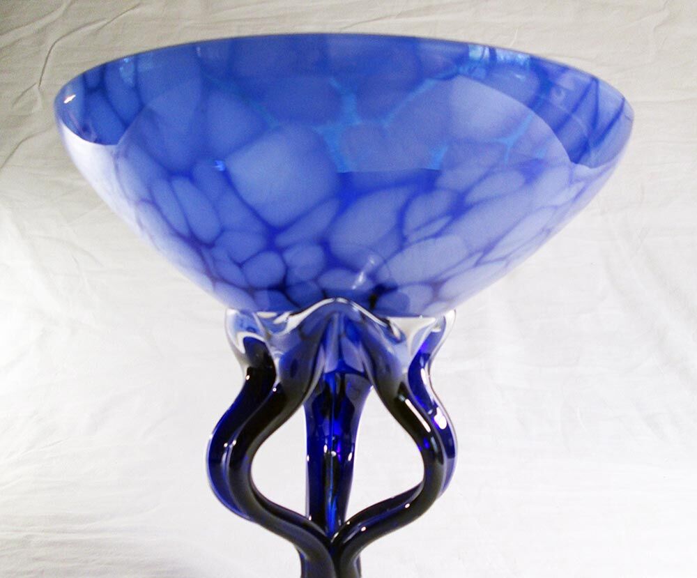 Blue glass cup on foot