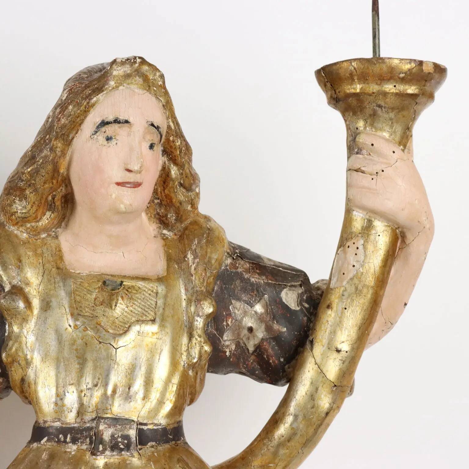 Antique wooden lacquered angel-shaped candlesticks, 18th century.