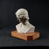 Terracotta bust of the smiling angel from Reims Cathedral with base