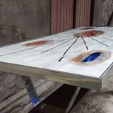 Coffee table with ceramic top.