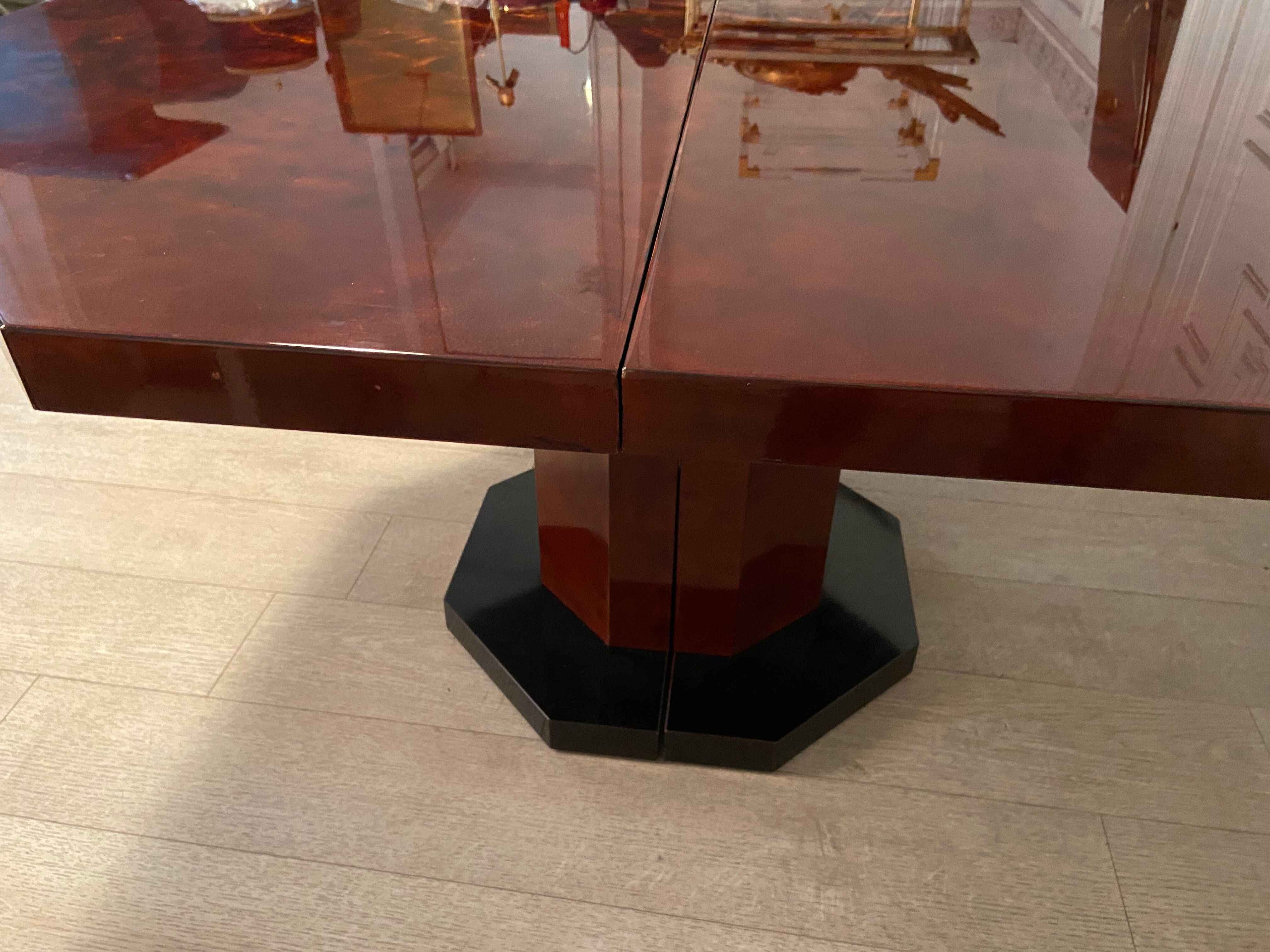 Red lacquered dining table and gold dust, 1970s