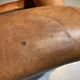 Brown leather armchair