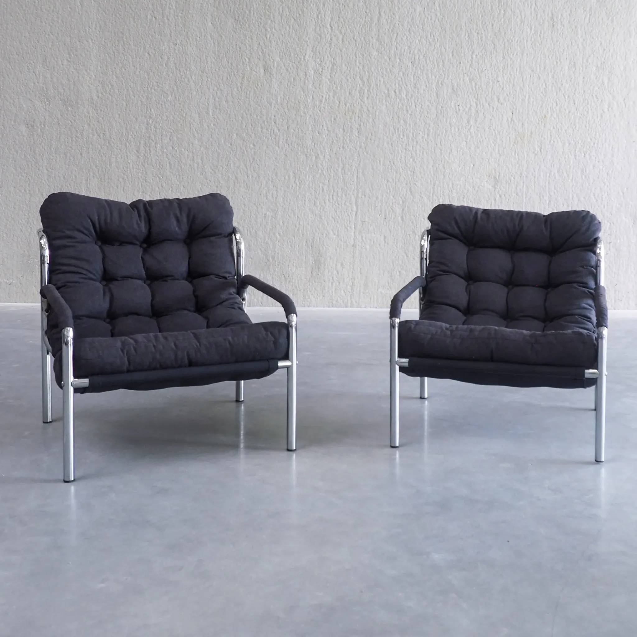 Pair of mid-century modern tubular lounge chairs