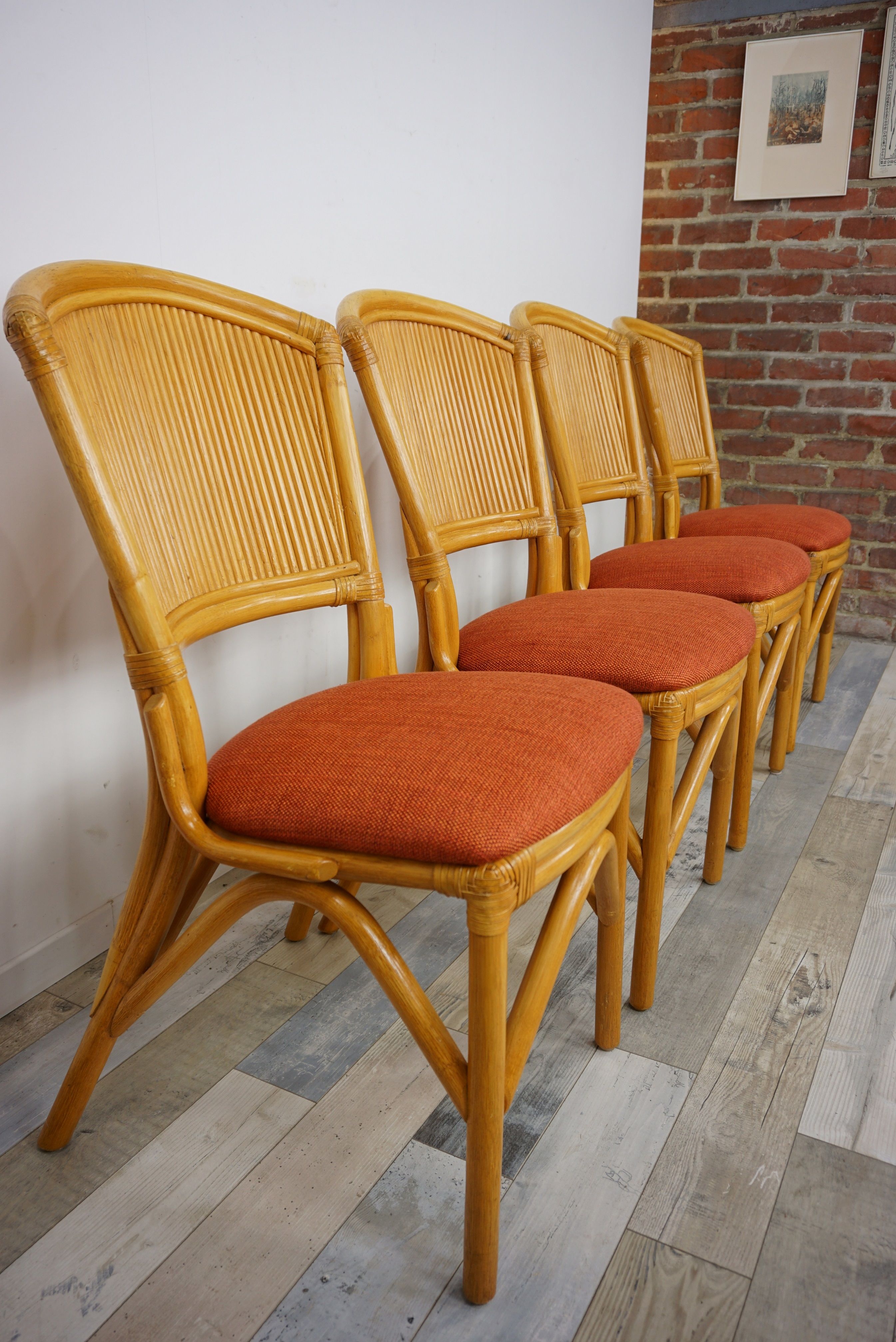 Suite of 4 chairs in Italian rattan design from the 60/70